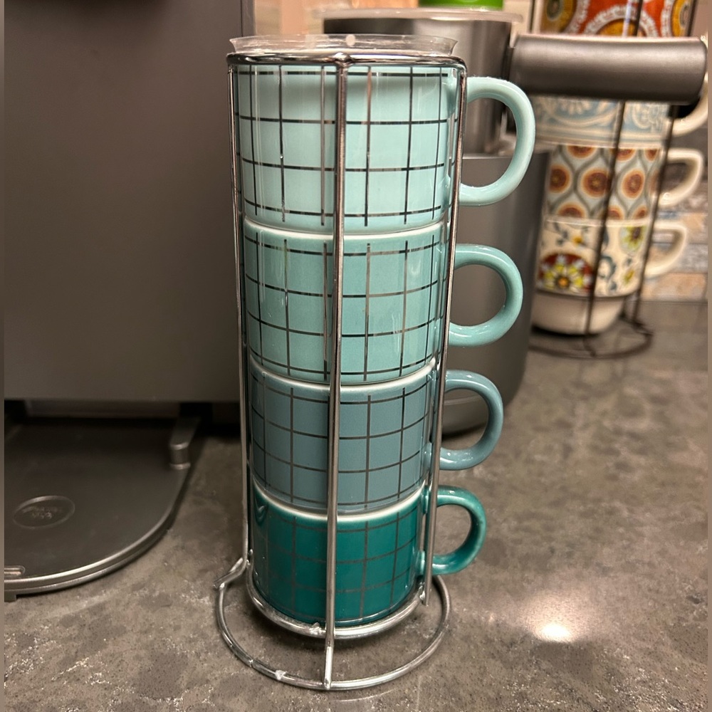 Set of 4 Harvey West espresso cups with holder.
